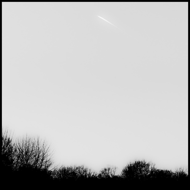 Grey Sky with Plane - ID 010959